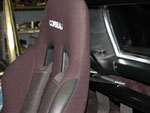 Seat belt mounts on roll bar