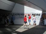 The "Caravan Ends Here" banner