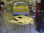 First coat of yellow paint on the doors