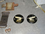 Tank emblems, battery cover and strap