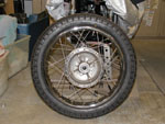 Left side of rear tire mounted on wheel